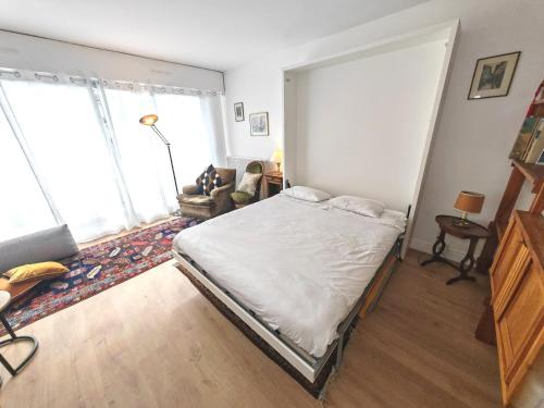 Photo de la galerie de l'établissement Appartement avec balcon et parking à Paris Alésia, à Paris