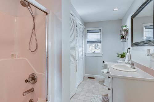 a white bathroom with a sink and a shower at Quiet Mountain-View Home Near Conway and Hiking in Fryeburg