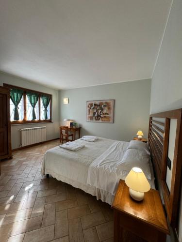 Postel nebo postele na pokoji v ubytování Cerqua Rosara Residence