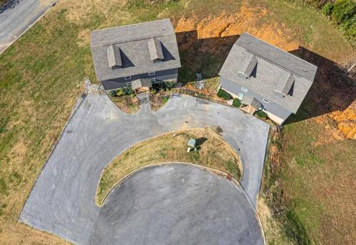 an overhead view of a parking lot with two houses at Willow Trace: Family Retreat, Hot Tub, Gaming! in Pigeon Forge