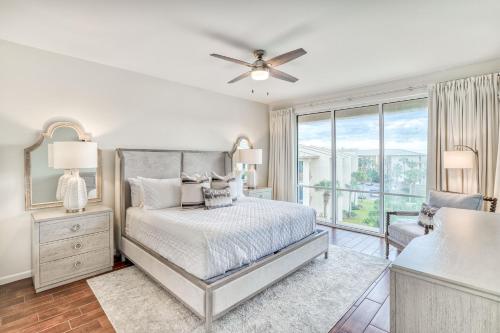 a bedroom with a bed and a ceiling fan at Hp 422 Blue Haven in Rosemary Beach
