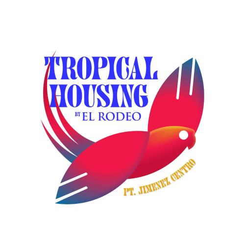 un pájaro rojo con las palabras rupias mejicanas remontando el heredero en Tropical Housing by El Rodeo - Puerto Jimenez Centro, en Puerto Jiménez