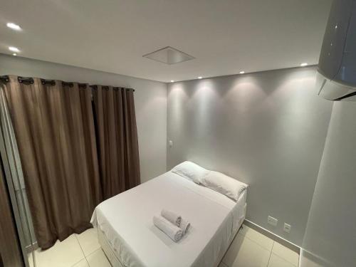 Ένα ή περισσότερα κρεβάτια σε δωμάτιο στο Flat no Gift Home Residence