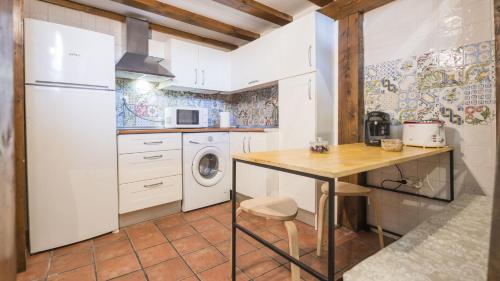 Kuchyň nebo kuchyňský kout v ubytování Apartamentos Zocosol by Toledo AP