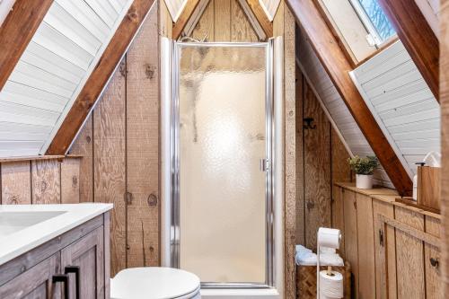 a bathroom with a shower and a toilet at 614 Aspen Woods Chalet in Innsbrook