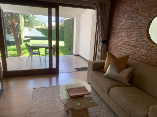 Area soggiorno di The Leslie Executive Hotel