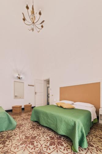 Voilà Rooms Guest Houseにあるベッド