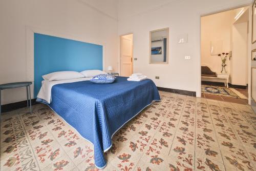 Voilà Rooms Guest Houseにあるベッド