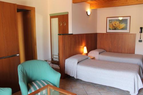 A bed or beds in a room at Villa Giglio