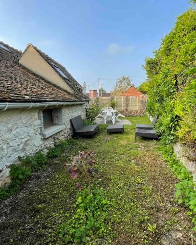 Taman di luar Maison pour s’évader à la campagne