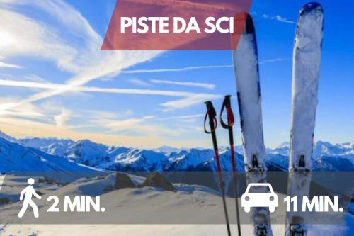 a poster of a person walking on a snow covered mountain at Centro Storico Sestola Wifi e Netflix in Sestola