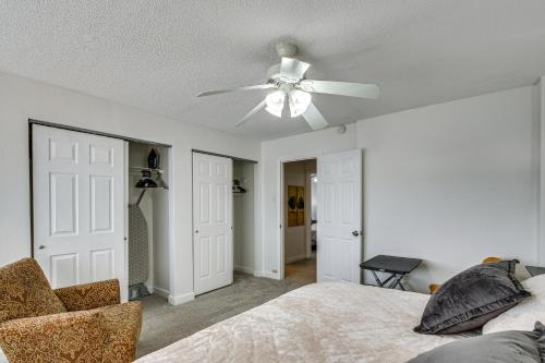 a bedroom with a ceiling fan and a bed at St Ann Townhome Less Than 1 Mi to International Airport! in Edmundson