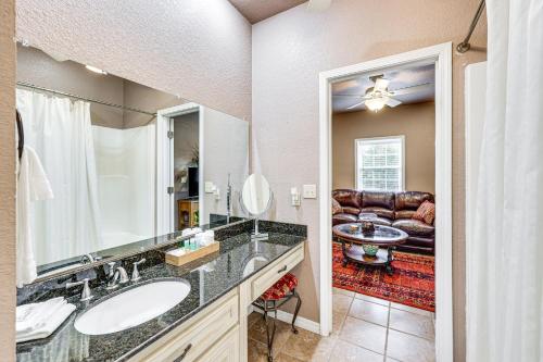 a bathroom with a sink and a large mirror at Pet-Friendly Dover Cottage w/ Deck + Mtn Views! in Dover
