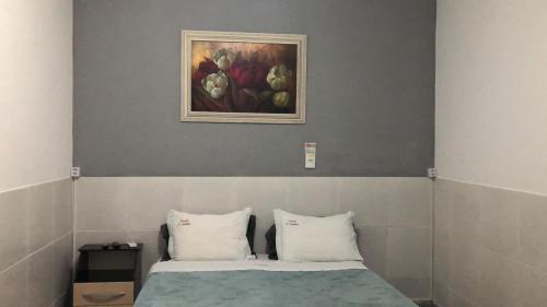 Ένα ή περισσότερα κρεβάτια σε δωμάτιο στο Pousada El Shaddai