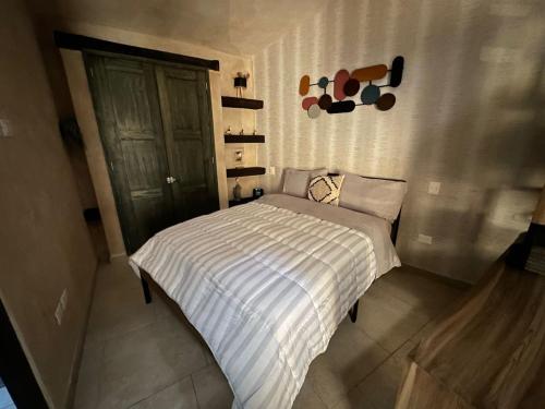 Ein Bett oder Betten in einem Zimmer der Unterkunft Loft Loreto en Val'Quirico