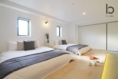b hotel Heiwaodori 702 - Huge Apt in Famous Hiroshima Dori for 6p