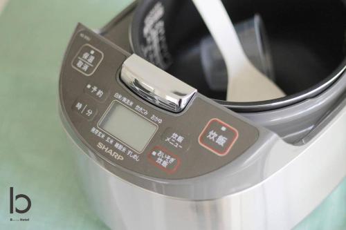 a close up of a speedometer on top of a cooker at b hotel Heiwaodori 601 - New Apt In Famous Hiroshima Dori For 6p in Hiroshima