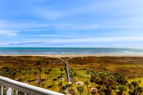 a view of the ocean from the balcony of a resort at Galvestonian 710 in Galveston
