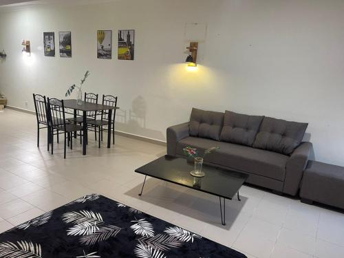Area soggiorno di Desaru Homestay Southern, Tiara Desaru Seaview Residensi