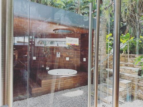 a glass shower with a toilet inside of it at Departamento en Puerto Madero in Buenos Aires