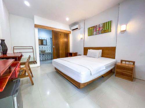 Postel nebo postele na pokoji v ubytování Lara Homestay