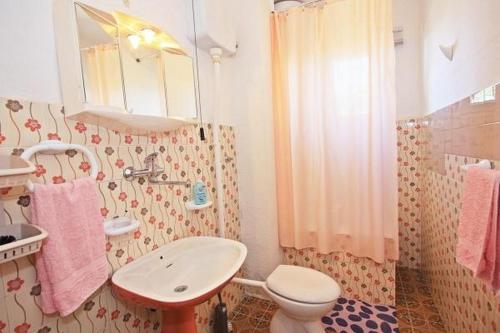 Apartments with parking space Supetar, Brac - 22504