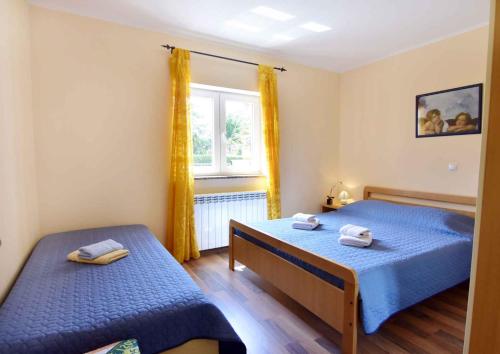 Apartments with parking space Djuba, Umag - 22548