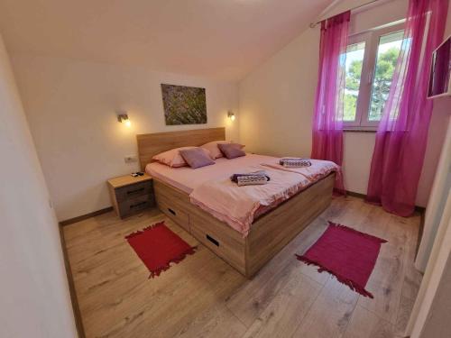 Apartments with parking space Mundanije, Rab - 22552