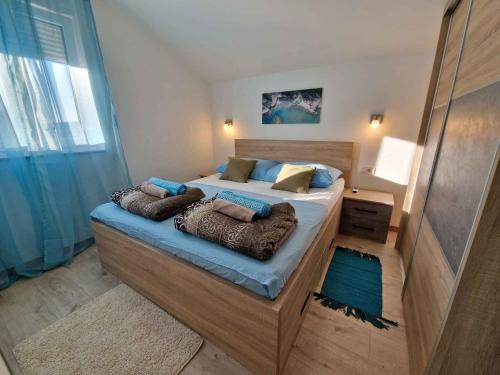 Apartments with parking space Mundanije, Rab - 22552