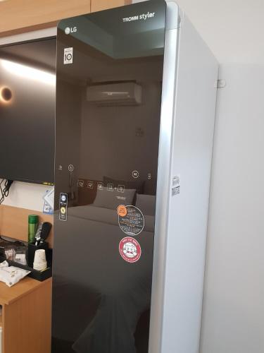 a door to a room with a bed in it at Number 25 Hotel in Gwangju