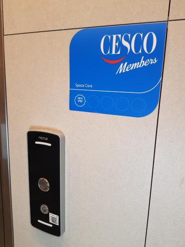 a sign that says cisco members on a refrigerator at Number 25 Hotel in Gwangju