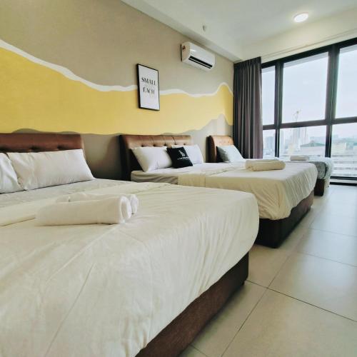 Katil atau katil-katil dalam bilik di New 2BR OR 3BR Serenity Homestay at Urban Suite by URBAN STAYCATIONS LOD