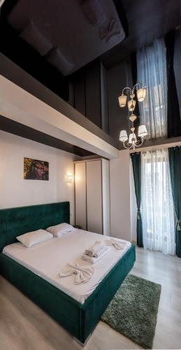 เตียงในห้องที่ TAN de LUX