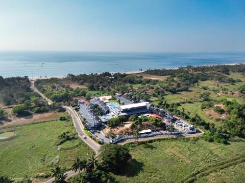 an aerial view of a resort next to the ocean at Baywatch Resort, Colva Goa in Colva