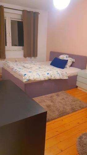 Кровать или кровати в номере Home 2 Share in Braunschweig in der Nähe vom VW und Stadium.