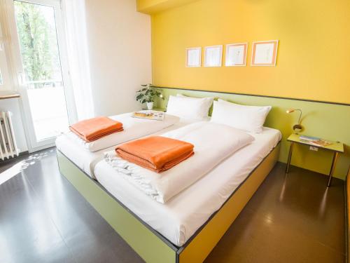 Postel nebo postele na pokoji v ubytování viavelo hotel
