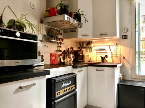 Photo de la galerie de l'établissement Flat in Montmartre La Planquette parking, à Paris