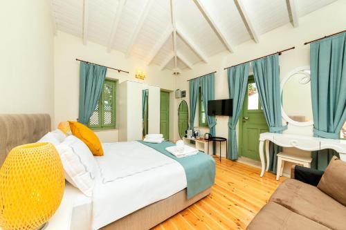Postel nebo postele na pokoji v ubytování Mets Boutique Hotel