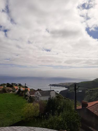 a view of the ocean from a house at Casa vicente in Santa Cruz das Flores