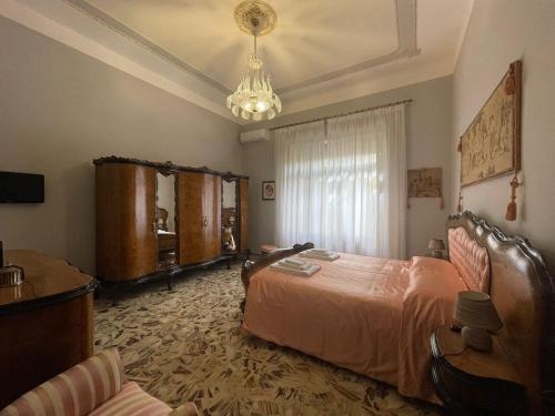 Giường trong phòng chung tại Villa Donna Maria