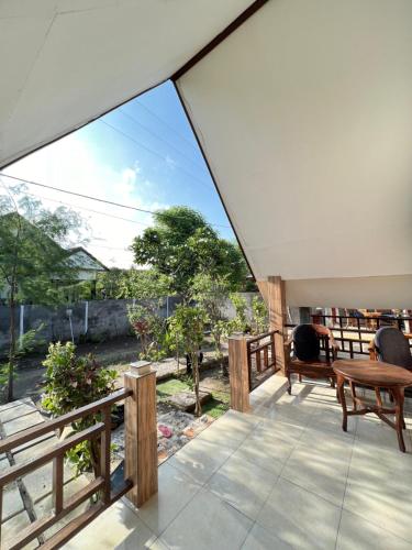 a view from the balcony of a house at Meno Melani guesthouse in Gili Meno