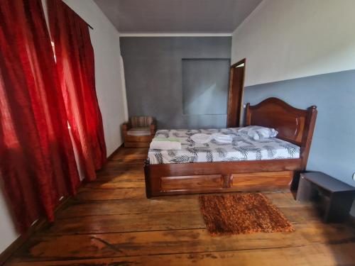 Ein Bett oder Betten in einem Zimmer der Unterkunft Monteiro Paradise Guest House