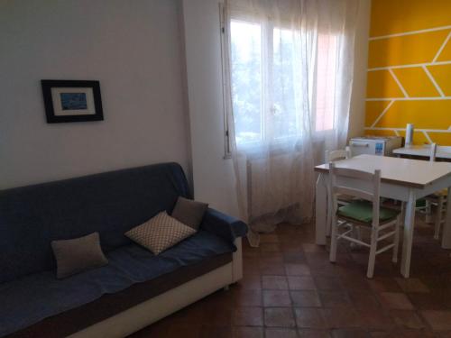 Χώρος καθιστικού στο Camere Casa Rosa Isola
