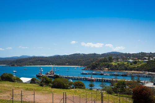 a view of a harbor with boats in the water at Snug Cove Villas in Eden