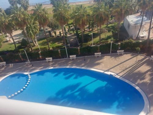 an overhead view of a swimming pool at a resort at Los Cuentos De Natalia / The Tales Of Natalia in Oropesa del Mar
