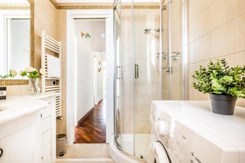 a bathroom with a shower and a sink at Bacoli Sveva Luxury House - Terrace & Design in Bacoli