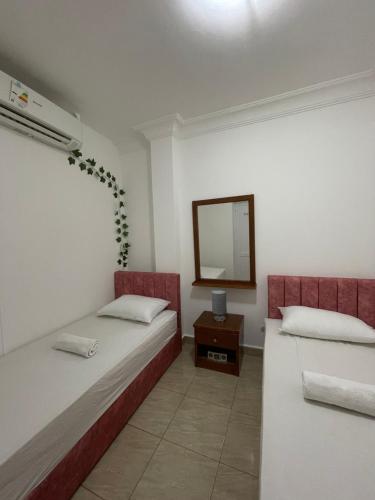 Кровать или кровати в номере City center Delta Sharm Compound with swimming pool