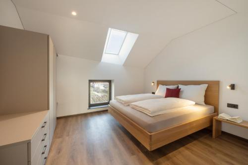 Ένα ή περισσότερα κρεβάτια σε δωμάτιο στο Moerlhof