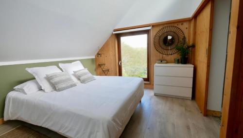 Posteľ alebo postele v izbe v ubytovaní NIDS SAUVAGES - Villa unique en baie de Somme