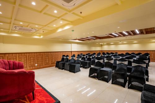 a conference room with chairs and tables in it at Regenta Central Puri Odisha in Puri